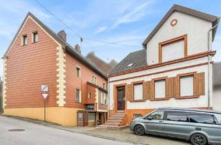 Haus kaufen in 66540 Neunkirchen, Zwei Immobilien mit großem Potential, 2 Garagen und großem Garten in Neunkirchen-Wiebelskirchen
