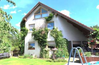 Haus kaufen in 12623 Mahlsdorf (Hellersdorf), Berlin-Mahlsdorf: Besonders gestaltete DHH mit hübschem Garten in idyllischer, ruhiger Wohnlage