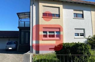 Haus kaufen in 66954 Stadtmitte, Interessantes Zweifamilienhaus - teilvermietet