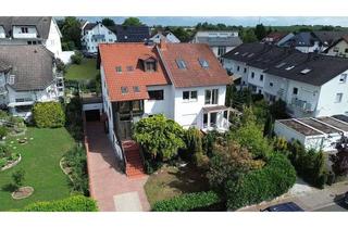 Doppelhaushälfte kaufen in 63486 Bruchköbel, Helle Doppelhaushälfte mit Wintergarten und Einliegerwohnung in familienfreundlicher Lage