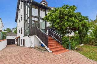 Doppelhaushälfte kaufen in 63486 Bruchköbel, Helle Doppelhaushälfte mit Wintergarten und Einliegerwohnung in familienfreundlicher Lage