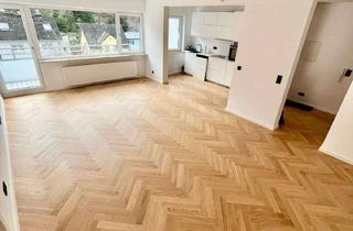 Wohnung mieten in Ostpreußenstraße 20C, 65207 Rambach, Stilvolle 2-Zimmer-Wohnung mit Balkon, neuwertiger EBK & Stellplatz – Wiesbaden-Rambach