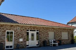 Haus kaufen in 31638 Stöckse, Modernes Wohngefühl auf einer Ebene–Traum-Bungalow mit Weinbereich & Terrassenparadies!