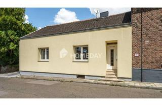 Einfamilienhaus kaufen in 52457 Aldenhoven, Charmantes Einfamilienhaus mit einladender Terrasse und malerischem Hof