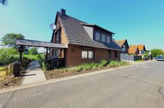 Haus kaufen in 31177 Harsum, Renoviertes Familiendomizil mit Einliegerwohnung und traumhaften Teich direkt vor der Haustür