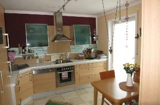 Wohnung kaufen in 85077 Manching, Manching - Wohnglück mit Gartenparadies und Garage - Exklusive 3-Zimmer-Oase