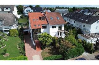 Doppelhaushälfte kaufen in 61130 Nidderau, Nidderau - Helle Doppelhaushälfte mit Wintergarten und Einliegerwohnung