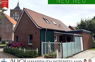 Einfamilienhaus kaufen in 26736 Krummhörn, Mit Blick auf die Kreuzkirche: Teilmodernisiertes EFH mit kl. Außenbereich in malerischer Lage