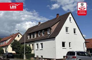 Haus kaufen in 37197 Hattorf, Ihr gemütliches Eigenheim - 72,90 m² Wohnfläche, Kamin und schöner Garten