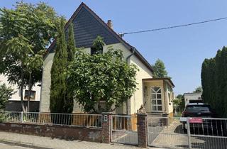 Einfamilienhaus kaufen in 67578 Gimbsheim, Einfamilienhaus mit Gartenanteil und großer Garage