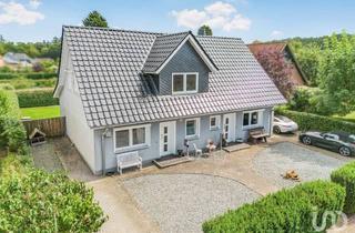 Haus kaufen in 24637 Schillsdorf, Nachhaltig wohnen, gemeinsam leben – KfW 60-Haus mit Einliegerwohnung