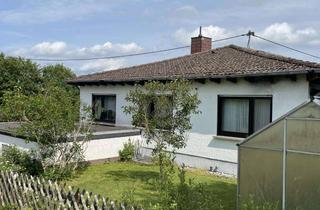 Haus kaufen in Hauptstraße 12, 57614 Stürzelbach, Charmanter Bungalow mit großem Garten und einer vermieteten Einliegerwohnung