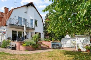 Einfamilienhaus kaufen in 65428 Rüsselsheim, Attraktives Einfamilienhaus mit Garten in Rüsselsheim
