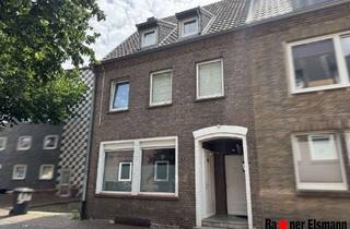 Einfamilienhaus kaufen in 46446 Emmerich, Emmerich: Geräumiges Stadthaus mit Sanierungsbedarf – Ihre Chance!