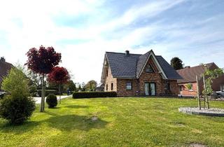 Haus kaufen in 26532 Großheide, Gepflegtes 3-Giebel-Haus auf großem Grundstück