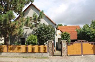 Haus kaufen in 04860 Torgau, Solides Wohnhaus mit Nebengelass, Garagen und großem Naturgarten am Ortsrand von Süptitz