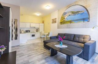 Wohnung kaufen in 38667 Bad Harzburg, Traumhaftes Ferienwohnungspaket: 3 Terrassenwohnungen als Top-Kapitalanlage