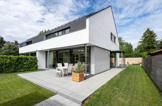 Haus kaufen in 82178 Puchheim, AIGNER - Wunderschönes Architektenhaus mit hochwertiger Ausstattung und Gartendomizil