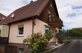 Einfamilienhaus kaufen in 97702 Münnerstadt, massiv gebautes, freistehendes Einfamilienhaus mit Garage und Garten