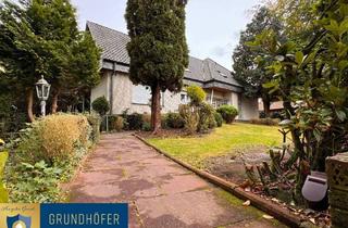 Einfamilienhaus kaufen in 26219 Bösel, Bösel - Zweifamilienhaus mit parkähnlichem Grundstück in traumhafter Lage in Bösel