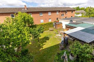 Wohnung kaufen in 21339 Lüneburg, Zentral gelegene 4-Zimmer-Wohnung mit Gartenanteil und Stellplätzen in Lüneburg