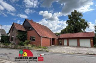 Haus kaufen in 31711 Luhden, Kapitalanlage oder Selbstnutzung - Wohnhaus mit zwei Einheiten