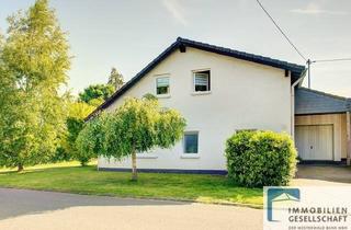 Einfamilienhaus kaufen in 56305 Döttesfeld, Geräumiges Ein- bis Zweifamilienhaus mit Traumblick in die Natur!
