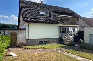 Wohnung kaufen in 66265 Heusweiler, Heusweiler - Traumhafte Erdgeschosswohnung in 3 FH mit Garten und Einbauküche