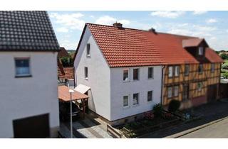 Doppelhaushälfte kaufen in 34379 Calden, Calden - Stilvoll wohnen im Fachwerkhaus - mit Nebengebäude, Garten und Carport