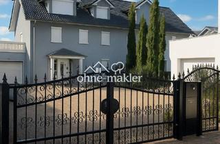 Einfamilienhaus kaufen in 64807 Dieburg, Hochwertiges Einfamilienhaus in begehrter Lage von Dieburg mit stilvollem Wintergarten