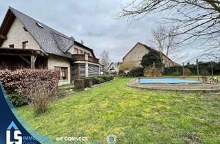 Einfamilienhaus kaufen in 39596 Hindenburg, Hindenburg - Exklusives Traumhaus mit Naturstein-Fassade, Pool, Garage und separatem Büro - Luxus pur!