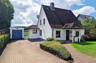 Einfamilienhaus kaufen in 25746 Ostrohe, Blick ins Grüne - Einfamilienhaus mit Garage und schönem Grundstück in guter Lage
