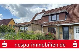 Doppelhaushälfte kaufen in 24966 Sörup, Solarthermie zur Warmwasserversorgung! Teilunterkellerte Doppelhaushälfte mit Garage und Terrasse