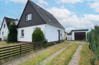 Einfamilienhaus kaufen in 25436 Moorrege, Stark sanierungsbedürftiges Einfamilienhaus auf attraktivem Grundstück
