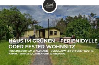 Haus kaufen in 14727 Premnitz, Rückzugsort im Grünen: Bungalow mit offener Küche, Kamin, Garten und Pool in herrlicher Waldrandlage