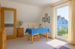 Wohnung kaufen in 25849 Pellworm, Vermietete 2-Zimmer-Wohnung mit Einbauküche und Balkon – nur wenige Schritte von der Nordsee.