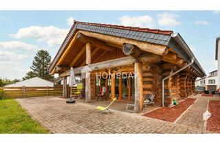 Haus kaufen in 66787 Wadgassen, Ihr Traumhaus im Blockhausstil – Naturnahes Wohnen auf großzügigem Grundstück