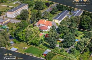 Haus kaufen in 18314 Löbnitz, Viel Platz für Ihre Vision – Anwesen mit 367 m² Wohnfläche, sanierten Wohnungen & großem Garten