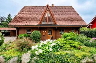 Einfamilienhaus kaufen in 25884 Viöl, Gemütlich, natürlich, nachhaltig: Blockbohlen-Einfamilienhaus mit viel Platz für seine Bewohner.