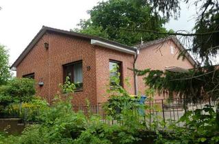 Haus kaufen in Am Sportplatz 19, 25712 Burg, Bungalow mit Teilkeller in Burg