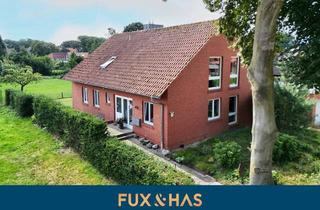 Haus kaufen in 49844 Bawinkel, Ruhige Wohnlage, flexible Nutzung - vermietetes Zweifamilienhaus in Bawinkel!