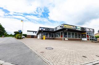 Haus kaufen in 25794 Pahlen, Renditeobjekt mit 2 Wohnungen und einer Gewerbeeinheit in Pahlen