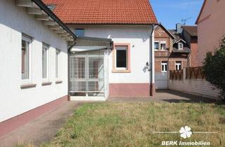 Einfamilienhaus kaufen in 63811 Stockstadt, Stockstadt am Main - BERK Immobilien - Solides Wohnhaus mit 5 Schlafzimmern und praktischem Anbau
