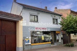 Haus kaufen in 55597 Wöllstein, 2 Wohnungen & 1 Ladenlokal in zentraler Lage