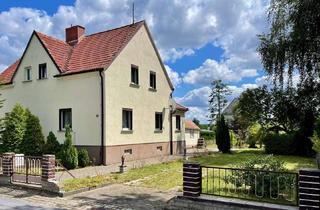 Doppelhaushälfte kaufen in 01900 Großröhrsdorf, Charmante Doppelhaushälfte mit großem Garten in gefragter Lage