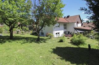 Mehrfamilienhaus kaufen in 35321 Laubach, Großzügiges Mehrfamilienhaus am Waldrand – 230 m² Wohntraum mit Garten, Wintergarten & Garage