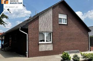 Haus kaufen in 49163 Bohmte, Wohnen in Bohmte - ruhig aber lebendig! Zweifamilenhaus mit Keller