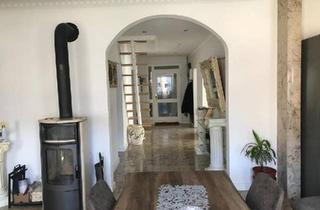 Wohnung kaufen in 21614 Buxtehude, Buxtehude - Exklusiv sanierte 4-Zimmer-Wohnung mit Garten - Denkmalgeschützt