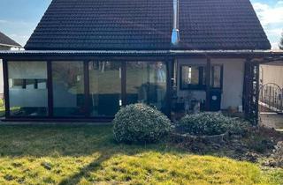 Einfamilienhaus kaufen in 56237 Nauort, Nauort - Einfamilienhaus mit Wintergarten, Kamin und Doppelgarage