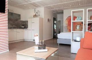 Wohnung kaufen in 25761 Büsum, Büsum - Großartige Ferienwohnung mit Südterrasse in zentraler Lage Büsums